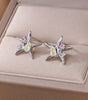 Natural white pressed daisy earrings - Ugarra