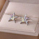 Natural white pressed daisy earrings - Ugarra