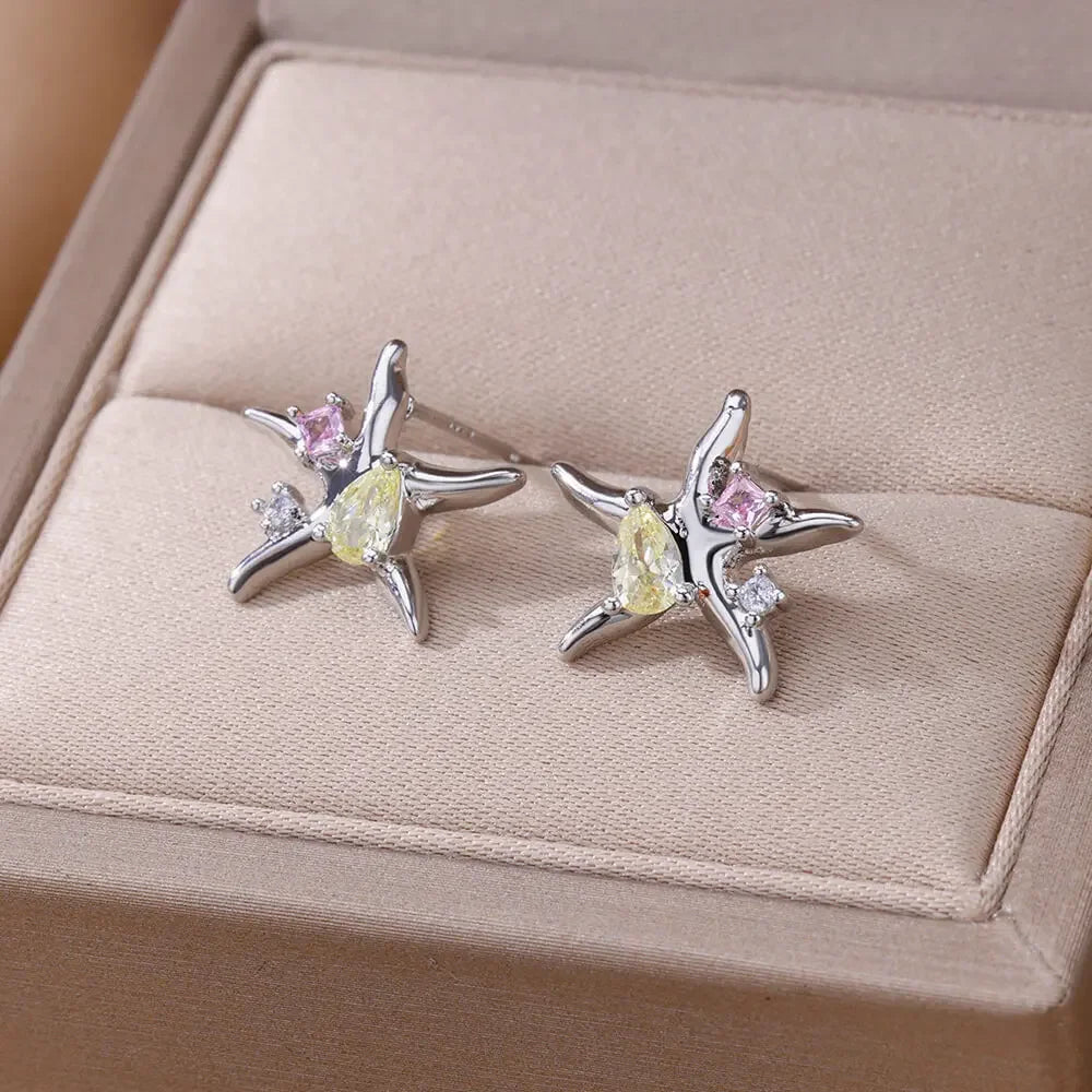 Natural white pressed daisy earrings - Ugarra