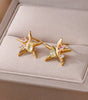 Natural white pressed daisy earrings - Ugarra